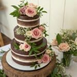 cascading flowers on naked cake